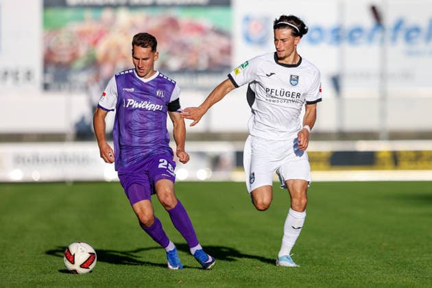 September 23, 2026, xkwix, soccer, exhibition match, SC Wiedenbrück vs. VfL Osnabrück, Jahnstadion, exhibition match, 2026–2027 Season: Konrad Faber (VfL Osnabrück, No. 28) in a tackle against Leon Alexander Kayser (SC Wiedenbrück, No. 19). DFB regulations prohibit any use of photographs as image sequences and or quasi-video. Photo: xKamilxWilkowskixPressefotoKochx NorthRhineland-Westphalia, Germany