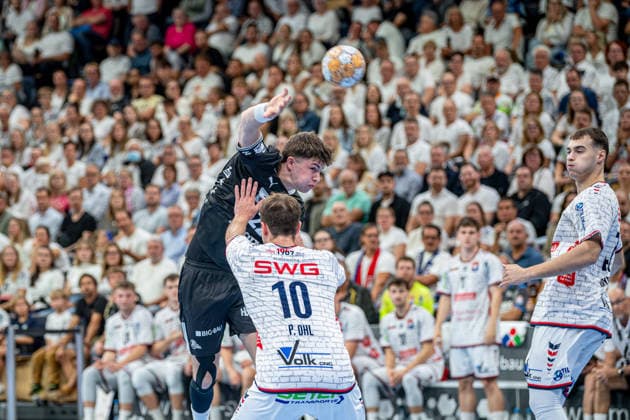 DHB Cup: TV Hüttenberg vs. THW Kiel, September 23, 2026; Rasmus Ankermann, THW Kiel, 22, Paul Ohl (TV Hüttenberg), 10, Danil Dyatlov (TV Hüttenberg), 47 DHB Cup: TV Hüttenberg vs. THW Kiel in Wetzlar, September 23, 2026 Copyright: xBEAUTIFULxSPORTS Roeczeyx