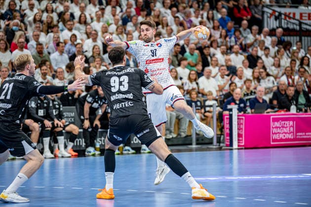 DHB Cup: TV Hüttenberg vs. THW Kiel, September 23, 2026; David Kuntscher (TV Hüttenberg), 97, Veron Nacinovic, THW Kiel, 93, Eric Johansson, THW Kiel, 21, DHB Cup: TV Hüttenberg vs. THW Kiel in Wetzlar, September 23, 2026 Copyright: xBEAUTIFULxSPORTS Roeczeyx