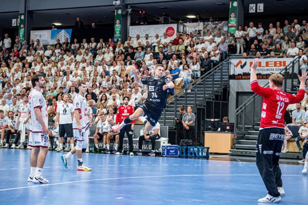 DHB Cup: TV Hüttenberg vs. THW Kiel, September 23, 2026; Vincent Büchner (THW Kiel), 74; Hendrik Schreiber (TV Hüttenberg), 51, Danil Dyatlov TV Hüttenberg, 47, Simon Böhne TV Hüttenberg, 12 DHB Cup: TV Hüttenberg vs. THW Kiel in Wetzlar, September 23, 2026 Copyright: xBEAUTIFULxSPORTS Roeczeyx