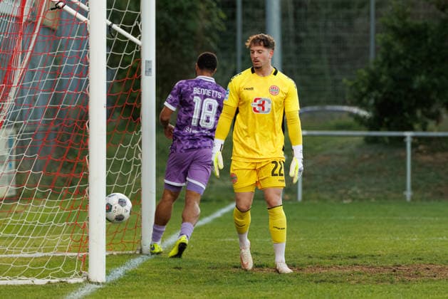 Maurice Merkl, 22, of TSV Landsberg is unable to prevent the goal that makes the score 0–1 in the match between TSV Landsberg and FC Ingolstadt 04, soccer, men s, Toto Cup, 2026–2027, Quarterfinals on September 23, 2026, in Landsberg am Lech, Sportpark Bayern, Germany