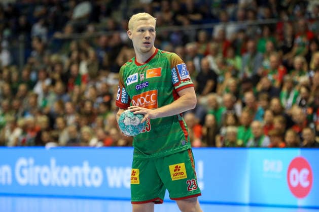 September 23, 2026, xgox, Handball DHB Cup, 2nd Round: SC Magdeburg vs. HSG Wetzlar emspor; from left: Magnus Saugstrup (Magdeburg), No. 23 with the ball, plays the ball (Magdeburg)