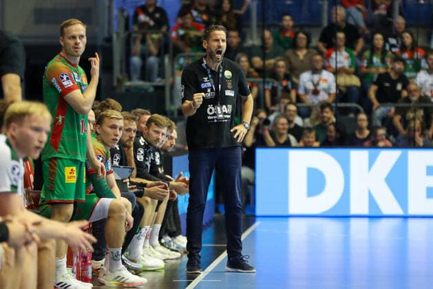 September 23, 2026, xgox, Handball DHB Cup, 2nd Round: SC Magdeburg vs. HSG Wetzlar, emspor; from left: Bennet Wiegert (Magdeburg), coach celebrating, goal celebration, celebrating the goal, Magdeburg celebration
