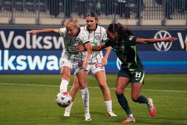 Germany Soccer UEFA Women s Europa Cup 2026–2027, Qualifying Round 2, First Leg: VfL Wolfsburg vs. SK Sturm Graz at AOK Stadium Wolfsburg; Kessya Bussy (VfL Wolfsburg Women), 19, and Linda Popofsits (Sturm Graz), 16, go head-to-head Copyright: xAymanxAlahmedx