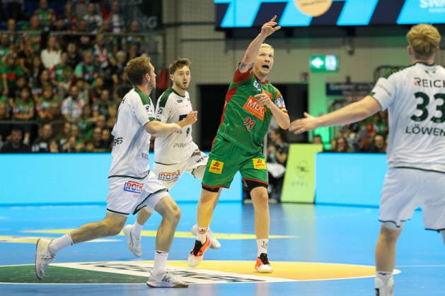 September 23, 2026, xgox, Handball DHB Cup, 2nd Round: SC Magdeburg vs. HSG Wetzlar emspor; from left: Magnus Saugstrup (Magdeburg), No. 23 with the ball, plays the ball (Magdeburg)