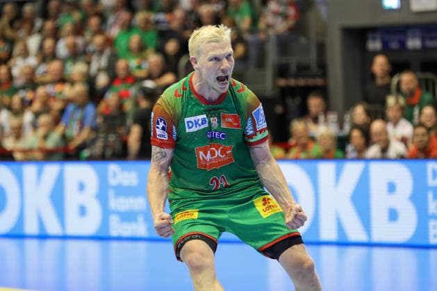 September 23, 2026, xgox, Handball DHB Cup, 2nd Round: SC Magdeburg vs. HSG Wetzlar, emspor; from left: Magnus Saugstrup (Magdeburg), 23, celebrating, goal celebration, cheering after the goal, celebrate the goal, celebration (Magdeburg)