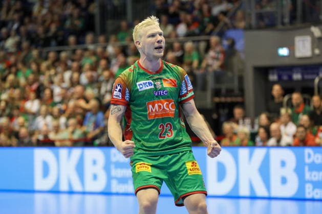 September 23, 2026, xgox, Handball DHB Cup, 2nd Round: SC Magdeburg vs. HSG Wetzlar, emspor; from left: Magnus Saugstrup (Magdeburg), 23, celebrating, goal celebration, cheering after the goal, celebrate the goal, celebration (Magdeburg)