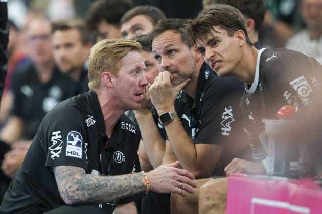 TV Hüttenberg vs. THW Kiel, DHB Cup: Coach Boerge Lund of THW Kiel in conversation with Julian Köster of THW Kiel; 7th DHB Cup match of the second round between TV Hüttenberg and THW Kiel on September 23, 2026, at the Buderus Arena in Wetzlar, Wetzlar, Hesse, Germany; Buderus Arena
