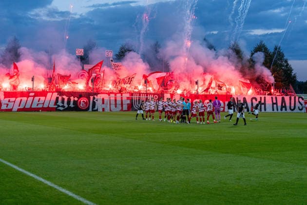 Fire, smoke, and flares before the Fortuna Düsseldorf vs. Schwarz-Weiss Alstaden match, soccer, Lower Rhine Cup, 2nd round, 2026–27 season, September 23, 2026, DFL regulations prohibit any use of photographs as image sequences and or quasi-video, Fortuna Düsseldorf vs. Schwarz Weiss Alstaden, soccer, Lower Rhine Cup, 2nd round, 2026–27 season, September 23, 2026, Düsseldorf Copyright: xEibner-Pressefoto LukasxBaldygax EP_LBA