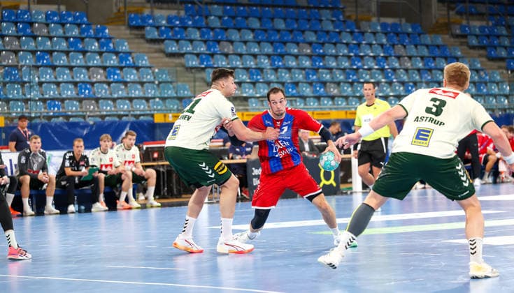 September 23, 2026, Germany, Bietigheim, Handball DHB Cup, 2026–2027 season, SG BBM Bietigheim vs. GWD Minden, from left: Mika Laurin Sajenev (GWD), Dominik Claus (BBM), Daniel Astrub (GWD), empty spectator stands, bleachers, grandstand