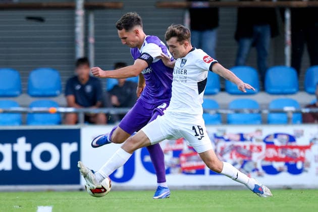 September 23, 2026, xkwix, soccer, exhibition match, SC Wiedenbrück vs. VfL Osnabrück, Jahnstadion, exhibition match, 2026–2027 season: Konrad Faber (VfL Osnabrück, No. 28) in a tackle against Timo Arnold (Kondziella, SC Wiedenbrück, No. 18). DFB regulations prohibit any use of photographs as image sequences and or quasi-video. Photo: xKamilxWilkowskixPressefotoKochx North Rhine-Westphalia, Germany