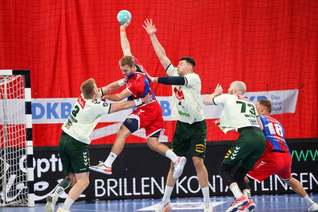 September 23, 2026, Germany, Bietigheim, DHB Handball Cup, 2026–2027 Season: SG BBM Bietigheim vs. GWD Minden; from left: Daniel Astrup (GWD), Mathias Larson (BBM), Mika Laurin Sajenev (GWD)