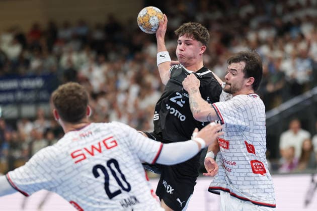 TV Hüttenberg vs. THW Kiel, DHB Cup: Rasmus Ankermann (THW Kiel, 22) vs. Leif Haack (TV Hüttenberg, 20) and Hendrik Schreiber (TV Hüttenberg), 51 DHB Cup second-round match between TV Hüttenberg and THW Kiel on September 23, 2026, at the Buderus Arena in Wetzlar, Wetzlar, Hesse, Germany; Buderus Arena