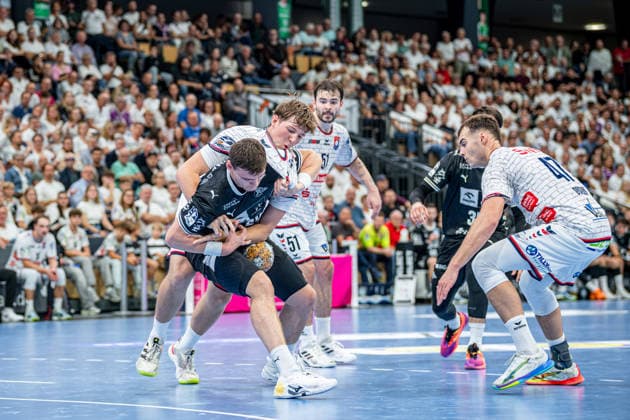 DHB Cup: TV Hüttenberg vs. THW Kiel, September 23, 2026; Lukas Laube (THW Kiel), 20; Julius Gümbel (TV Hüttenberg), 21; Hendrik Schreiber (TV Hüttenberg), 51, Danil Dyatlov TV Hüttenberg, 47 DHB Cup: TV Hüttenberg vs. THW Kiel in Wetzlar, September 23, 2026 Copyright: xBEAUTIFULxSPORTS Roeczeyx