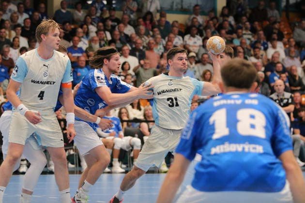 September 23, 2026 Men s Handball 2026–2027 DHB Cup, Round 2: Dessau Roßlauer HV 06 vs. VfL Gummersbach at Anhalt Arena, Dessau; Kay Smits (Gummersbach), 31, in a one-on-one battle against Nikola Roganovic Gummersbach, 23, Dessau Roßlau Saxony-Anhalt Germany