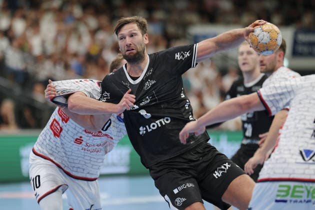 TV Hüttenberg vs. THW Kiel, DHB Cup: Harald Reinkind (THW Kiel), 6, vs. Paul Ohl (TV Hüttenberg), 10. Second-round DHB Cup match between TV Hüttenberg and THW Kiel on September 23, 2026, at the Buderus Arena in Wetzlar, Wetzlar, Hesse, Germany, Buderus Arena