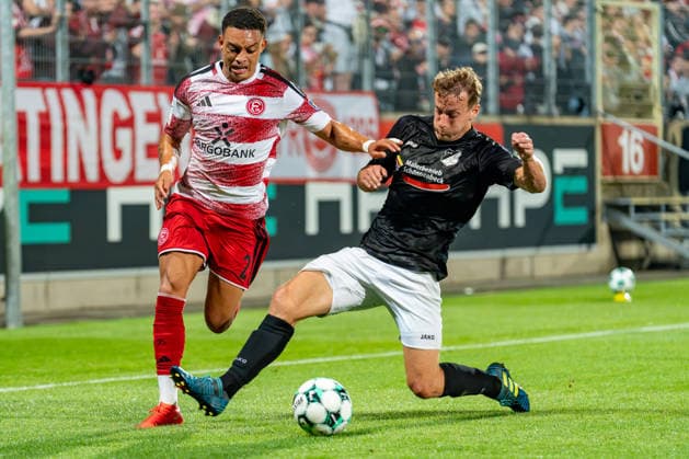 Steven van der Sloot (Fortuna Düsseldorf), 02, in a tackle with Danny Alkenbach (Schwarz Weiss 09 36 Oberhausen Alstaden), 07 Fortuna Düsseldorf vs. Schwarz Weiss Alstaden, Soccer, Lower Rhine Cup, 2nd Round, 2026–27 Season, September 23, 2026, DFL regulations prohibit any use of photographs as image sequences and or quasi-video. Fortuna Düsseldorf vs. Schwarz Weiss Alstaden, soccer, Lower Rhine Cup, 2nd round, 2026–27 season, September 23, 2026, Düsseldorf Copyright: xEibner-Pressefoto LukasxBaldygax EP_LBA