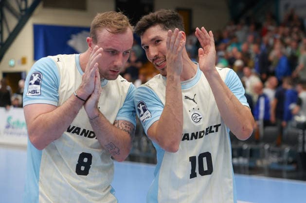 September 23, 2026, xtgx, DHB Cup 2nd Round, Dessau Rosslauer HV 06 vs. VfL Gummersbach emspor, from left: Lukas Blohme (Gummersbach), 8; Alex Dujshebaev (Gummersbach), 10; Celebrating the victory; Celebrations after the game in Dessau
