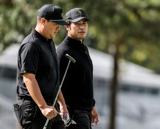 International team member Sungjae Im of South Korea (L) and International team member Hideki Matsuyama of Japan (R) walk up the fourteenth fairway during practice for the Presidents Cup golf tournament at Medinah Country Club in Medinah, Illinois on Wednesday, September 23, 2026. Competition between the USA and the International team begins on Thursday, September 24 with Four-Ball play.  MED20260923826 TANNENxMAURY