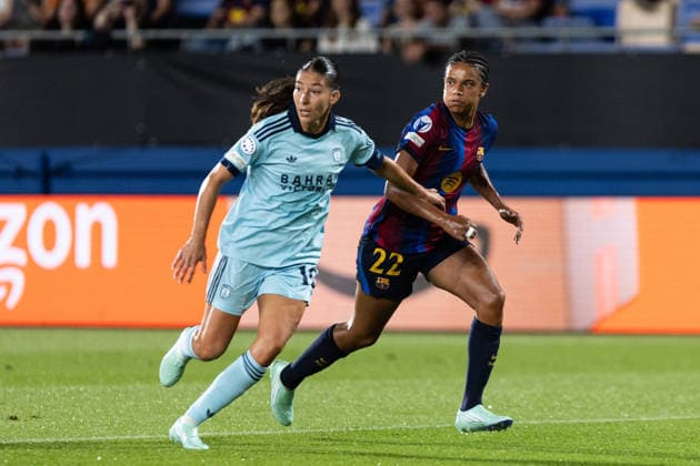 September 23, 2026, Sant Joan Despo, Catalonia, Spain: Esmee Brugts of FC Barcelona, Barca and Evelyne Viens of Paris FC challenge for the ball during the UEFA WomenÃ¢â‚¬â ¢s Champions League Matchday 1 match between FC Barcelona and Paris FC at Estadi Johan Cruyff in Sant Joan DespoÂ­, Barcelona, Spain. Sant Joan Despo Spain - ZUMAs316 20260923_znp_s316_042 Copyright: xMartixSeguraxRamonedax