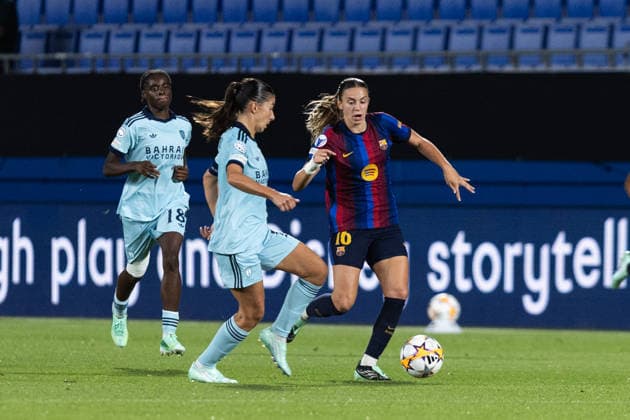 September 23, 2026, Sant Joan Despo, Catalonia, Spain: Irene Paredes of FC Barcelona, Barca and Evelyne Viens of Paris FC challenge for the ball during the UEFA WomenÃ¢â‚¬â ¢s Champions League Matchday 1 match between FC Barcelona and Paris FC at Estadi Johan Cruyff in Sant Joan DespoÂ­, Barcelona, Spain. Sant Joan Despo Spain - ZUMAs316 20260923_znp_s316_051 Copyright: xMartixSeguraxRamonedax