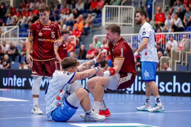 September 23, 2026, 2nd Round of the DHB Cup: TuSEM Essen 1, VfL Potsdam, Adin Faljic; TuSEM Essen 08 helps Tommaso Romei and VfL Potsdam 50 get back on their feet; North Rhine-Westphalia, Germany