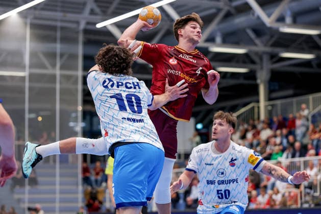 September 23, 2026, 2nd Round of the DHB Cup: TuSEM Essen 1, VfL Potsdam. Felix Göttler (TuSEM Essen 04) shoots the ball toward the goal against Giacomo Savini (VfL Potsdam 10), NRW, Germany