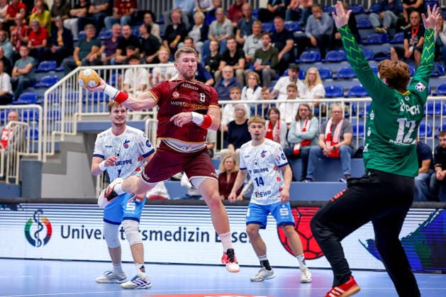 September 23, 2026, 2nd Round of the DHB Cup, TuSEM Essen 1 vs. VfL Potsdam; Adin Faljic (TuSEM Essen 08) shoots at the goal defended by Max Grundmann (VfL Potsdam 12), NRW, Germany