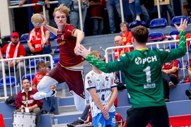 September 23, 2026, 2nd Round of the DHB Cup: TuSEM Essen 1 vs. VfL Potsdam. Finley Werschkull (TuSEM Essen 73) shoots the ball at the goal defended by Frederik Höler (VfL Potsdam 01). NRW, Germany