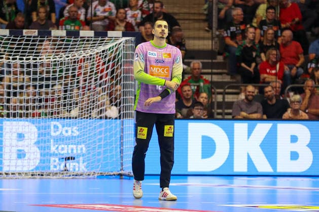 September 23, 2026, xgox, Handball DHB Cup, Round 2: SC Magdeburg vs. HSG Wetzlar (emspor), from left: Matej Mandic (Magdeburg), 12 (Magdeburg)