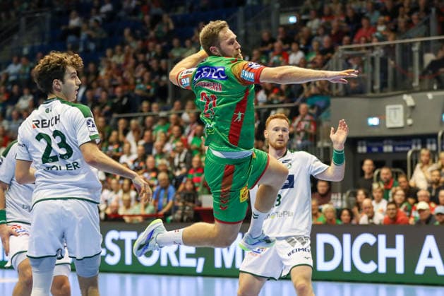 September 23, 2026, xgox, Handball DHB Cup, Round 2: SC Magdeburg vs. HSG Wetzlar emspor; from left: Albin Lagergren (Magdeburg), No. 21 takes a shot, goal scorer, scores a goal, Magdeburg
