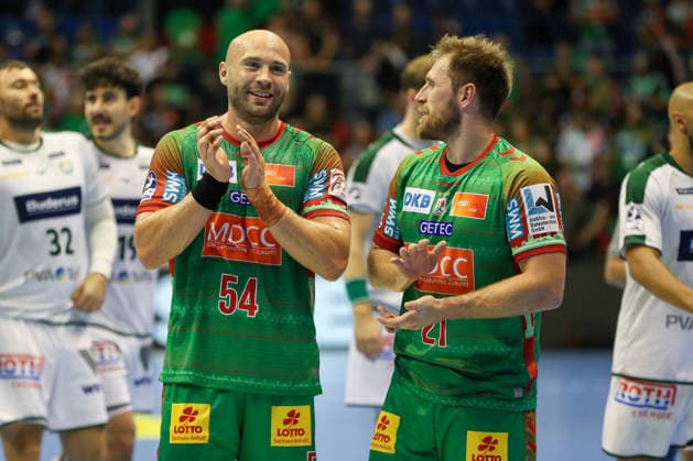 September 23, 2026, xgox, Handball DHB Cup, 2nd Round: SC Magdeburg vs. HSG Wetzlar emspor; from left: Oscar Bergendahl (Magdeburg), 54; Albin Lagergren (Magdeburg), 21; celebrating the victory, Celebrations after the game in Magdeburg