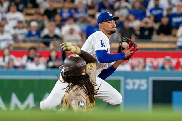 September 24, 2026, Los Angeles, California, USA: Mookie Betts 50 of the Los Angeles Dodgers makes an out on Fernando Tatis Jr 23 of the San Diego Padres during a regular-season MLB, Baseball Herren, USA game on Tuesday September 22, 2026 at Dodger Stadium in Los Angeles, California. Dodgers defeat Padres, 7-0. ENRIQUE GURROLA BNS PI Dodgers Defeat Padres, 7-0  - ZUMAp124 20260924_zaa_p124_001 Copyright: xEnriquexGurrolax