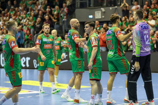 September 23, 2026, xgox, Handball DHB Cup, Round 2: SC Magdeburg vs. HSG Wetzlar (emspor), from left: Magdeburg celebrating the victory, Magdeburg celebrating after the game