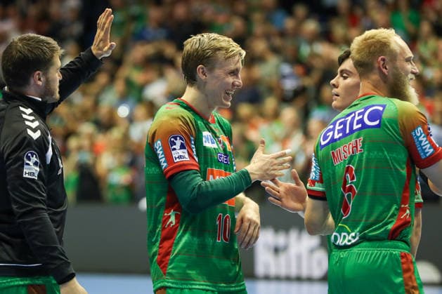 September 23, 2026, xgox, Handball DHB Cup, 2nd Round: SC Magdeburg vs. HSG Wetzlar, emspor; from left: Gisli, Thorgeir, Kristjansson (Magdeburg); 10: Celebrating the victory; Celebrations after the game (Magdeburg)