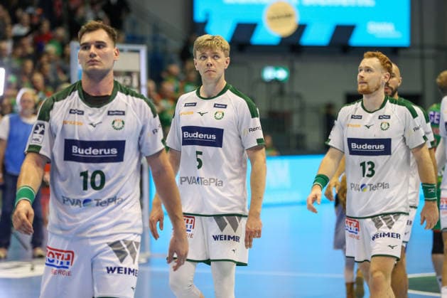 September 23, 2026, xgox, Handball DHB Cup, 2nd Round: SC Magdeburg vs. HSG Wetzlar, emspor; from left: Tristan Kirschner (Wetzlar), 5, looks disappointed; dejected, disappointed (Magdeburg)