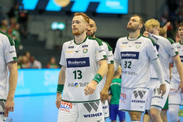 September 23, 2026, xgox, Handball DHB Cup, 2nd Round: SC Magdeburg vs. HSG Wetzlar, emspor; from left: Tomas Piroch (Wetzlar), 13, looks disappointed; dejected, disappointed (Magdeburg)