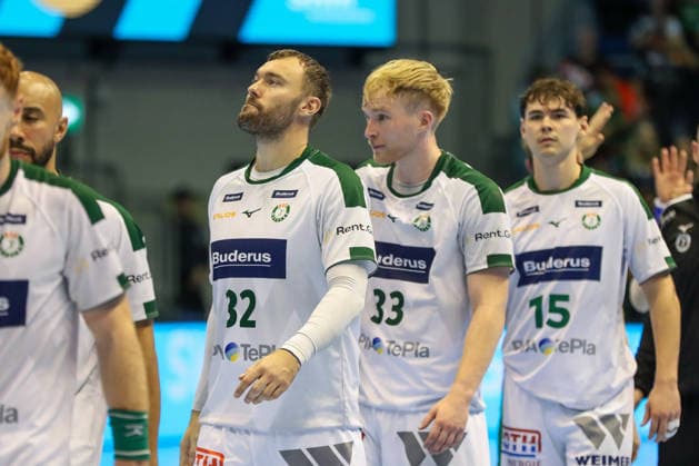 September 23, 2026, xgox, Handball DHB Cup Round 2 SC Magdeburg vs. HSG Wetzlar emspor, from left: Nikolaj Laeso (Wetzlar), 32, Georg Löwen (Wetzlar), 33, looking disappointed, dejected, Magdeburg
