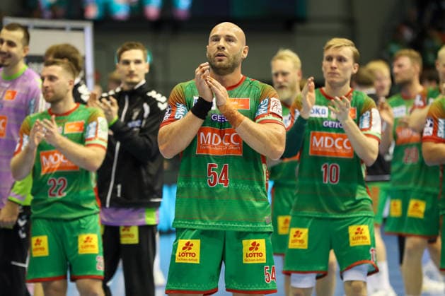September 23, 2026, xgox, Handball DHB Cup, 2nd Round: SC Magdeburg vs. HSG Wetzlar, from left: Oscar Bergendahl (Magdeburg), 54: Celebrating the victory; Celebrations after the game (Magdeburg)