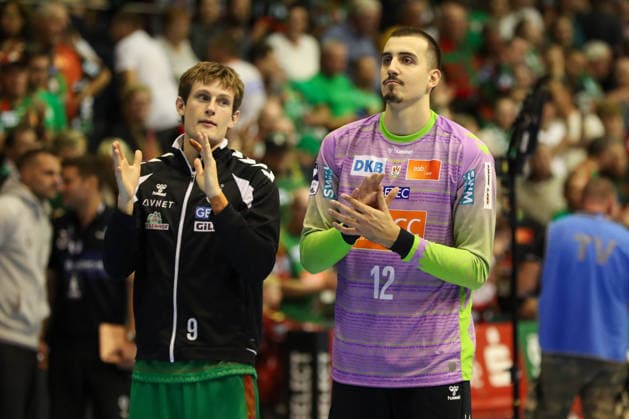 September 23, 2026, xgox, DHB Handball Cup, 2nd Round: SC Magdeburg vs. HSG Wetzlar, emspor; from left: Oskar Vind Rasmussen (Magdeburg), 9; Matej Mandic (Magdeburg), 12; Celebrating the victory, Celebrations after the game in Magdeburg
