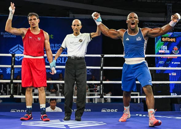 2026 European Boxing Elite Championships In Sofia SOFIA, BULGARIA - SEPTEMBER 23: Junior Tadah (Blue) of France celebrates after winning against Fares Deroiche (Red) of Austria during their Elite Men s Cruiserweight Semifinal match on Day 7 of the 2026 European Boxing Elite Championships at the Asics Arena Sports Hall in Sofia, Bulgaria, on September 23, 2026. Sofia Bulgaria  Copyright: xArturxWidakx originalFilename:widak-2026euro260923_npC1t.jpg