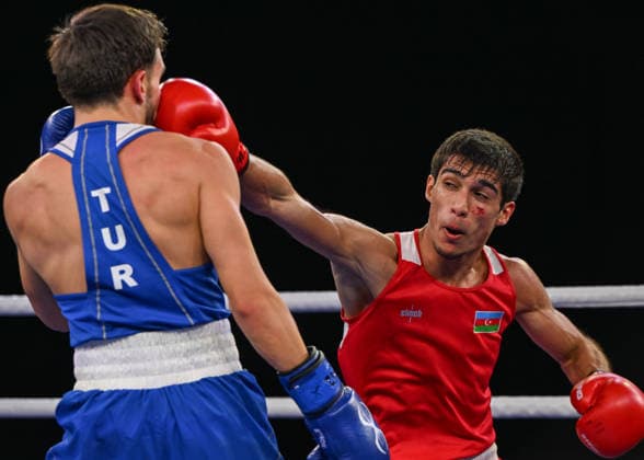 2026 European Boxing Elite Championships In Sofia SOFIA, BULGARIA - SEPTEMBER 23: Subhan Mamedov (Red) of Azerbaijan lands a sharp punch against Samet Gumus (Blue) of Turkey during their Elite Men s 51kg match on Day 7 of the 2026 European Boxing Elite Championships at the Asics Arena Sports Hall in Sofia, Bulgaria, on September 23, 2026. Sofia Bulgaria  Copyright: xArturxWidakx originalFilename:widak-2026euro260923_npKNU.jpg