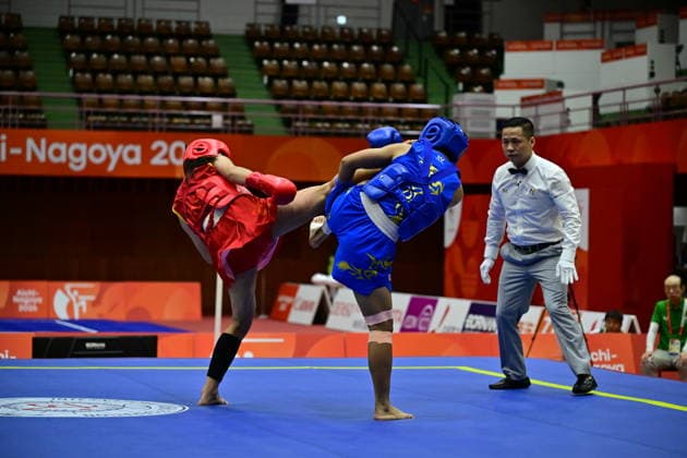 Asian Games 2026 Aichi-Nagoya, Japan India™s Naorem Roshibina Devi competes against China™s Zhang Xiaoyu in the Women™s 60kg Wushu Sanda final at the 20th Asian Games Aichi-Nagoya 2026 at the Aichi Prefectural Martial Arts Hall in Nagoya, Japan, on September 24, 2026. Roshibina Devi won the silver medal. Aichi Nagoya Japan Copyright: xSeshadrixSukumarx
