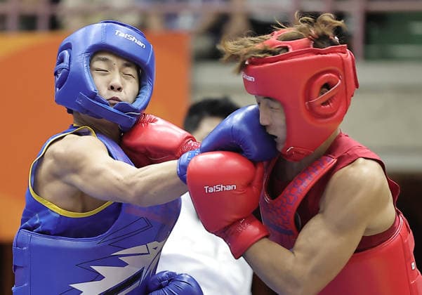 (260924) -- NAGOYA, Sept. 24, 2026 -- Tang Sishuo (L) of China fights with Leung Yu Hong of Hong Kong, China during the men s 60kg final of Wushu at the 20th Asian Games Aichi-Nagoya 2026 in Nagoya, Japan, Sept. 24, 2026. ) (SP)JAPAN-NAGOYA-ASIAN GAMES-WUSHU-MEN S 60KG FINAL LongxLei 