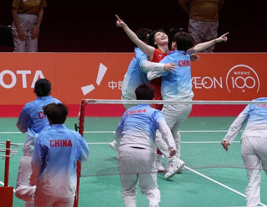 (260924) -- ICHINOMIYA, Sept. 24, 2026 -- Chen Yufei (top C) of team China celebrates with teammates after team China winning the badminton women s team final between China and Japan at the 20th Asian Games Aichi-Nagoya 2026 in Ichinomiya of Aichi Prefecture, Japan, Sept. 24, 2026. ) (SP)JAPAN-ICHINOMIYA-ASIAN GAMES-BADMINTON-WOMEN S TEAM-FINAL-CHN VS JPN LixBo 