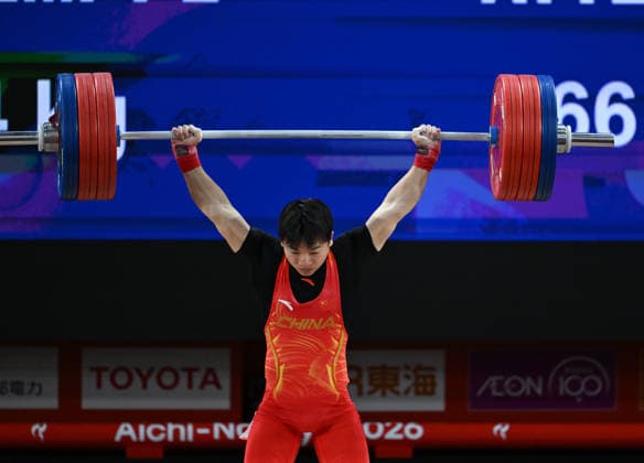 (260924) -- NAGOYA, Sept. 24, 2026 -- Yang Yang of China competes during the men s 60kg final of weightlifting at the 20th Asian Games Aichi-Nagoya 2026 in Nagoya, Japan, Sept. 24, 2026. ) (SP)JAPAN-NAGOYA-ASIAN GAMES-WEIGHTLIFTING-MEN S 60KG YuxYang 
