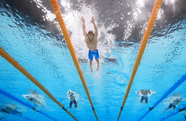 Aichi-Nagoya Asian Games: Swimming Japanese swimmer Shin Ohashi (top) competes en route to winning the Aichi-Nagoya Asian Games men s 200-meter breaststroke gold with a world record at Tokyo Aquatics Centre in Tokyo on Sept. 24, 2026.  A14AA0005628520P