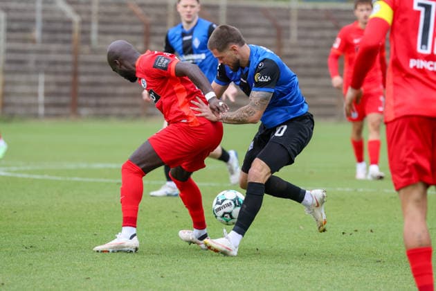 Julian Ulbricht (SV Waldhof Mannheim), 10, and Amara Conde (SV 07 Elversberg), 6, in a tackle during a soccer exhibition match, SV Waldhof Mannheim vs. SV 07 Elversberg on September 24, 2026, at Seppl Herberger Stadium in Mannheim, Germany; Seppl Herberger Stadium, Mannheim, Germany Copyright: xFranzxReindelx