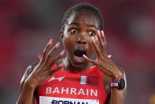 (260924) -- NAGOYA, Sept. 24, 2026 -- Winfred Yavi of Bahrain reacts after winning the women s 10000m final of Athletics at the 20th Asian Games Aichi-Nagoya 2026 in Nagoya, Japan, Sept. 24, 2026. ) (SP)JAPAN-NAGOYA-ASIAN GAMES-ATHLETICS-WOMEN S 10000M LuixSiuxWai 