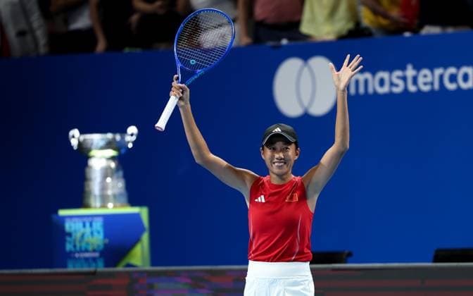 (260924) -- SHENZHEN, Sept. 24, 2026 -- Zhang Shuai of China celebrates after defeating Elisabetta Cocciaretto of Italy during the quarterfinal match between China and Italy at the 2026 Billie Jean King Cup Finals in Shenzhen, south China s Guangdong Province, Sept. 24, 2026. ) (SP)CHINA-SHENZHEN-TENNIS-BILLIE JEAN KING CUP-CHINA VS ITALY (CN) MaoxSiqian 
